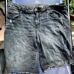 Faded black long denim cutoffs